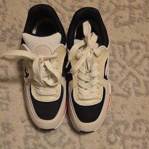 CHANEL Black and Cream Sneakers